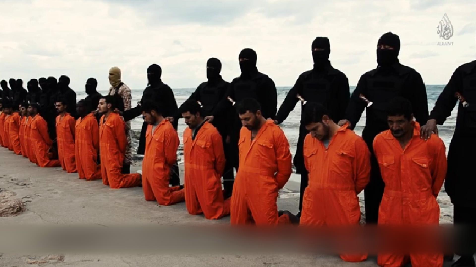 Христианский терроризм. Казнь коптов в Ливии 2015. Обезглавливание головы Аль Каида.